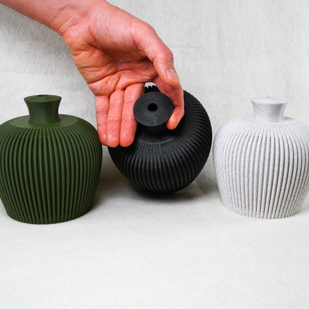 
                      
                        Ribbed Water Bell Thumb Pot
                      
                    