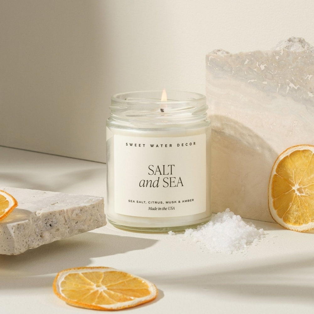 
                      
                        Sweet Water Decor Salt and Sea Soy Candle - Clear Jar - 9 oz - lily & onyx
                      
                    