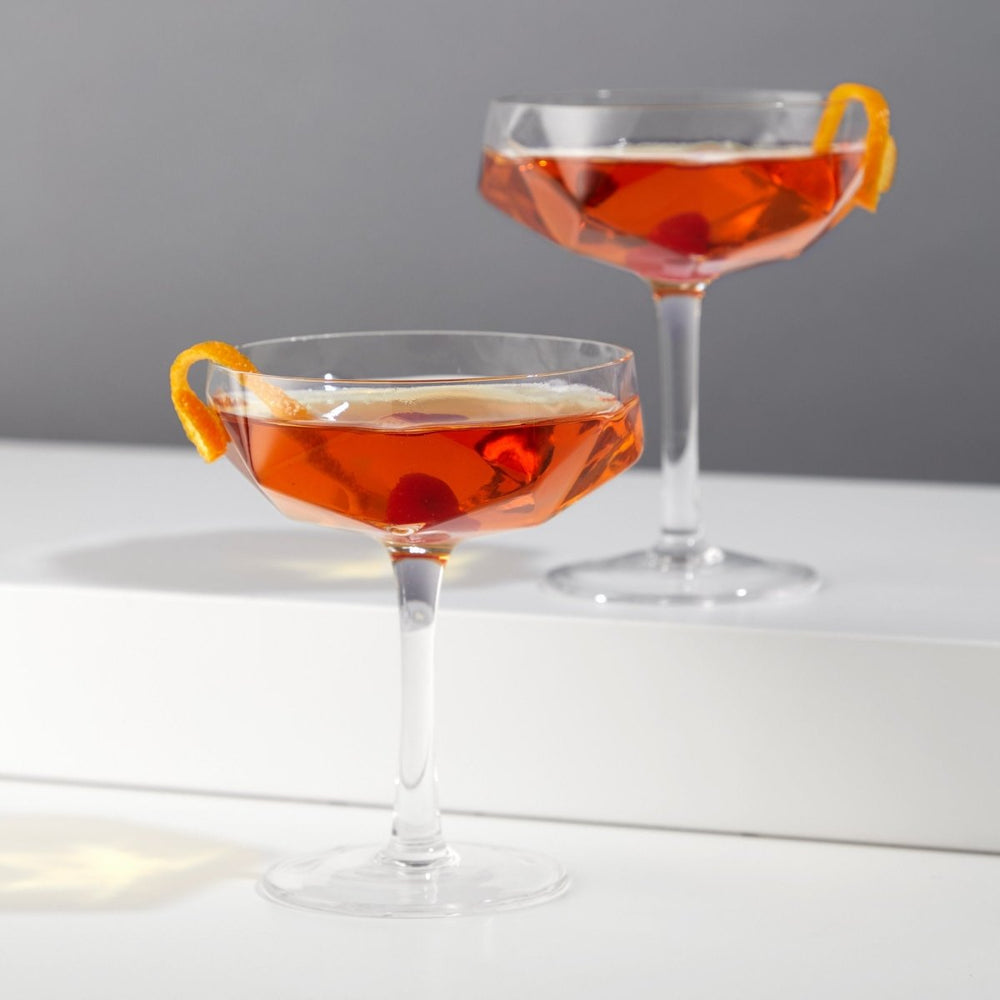 
                      
                        Viski Seneca Faceted Coupe Glasses, Set of 2 - lily & onyx
                      
                    