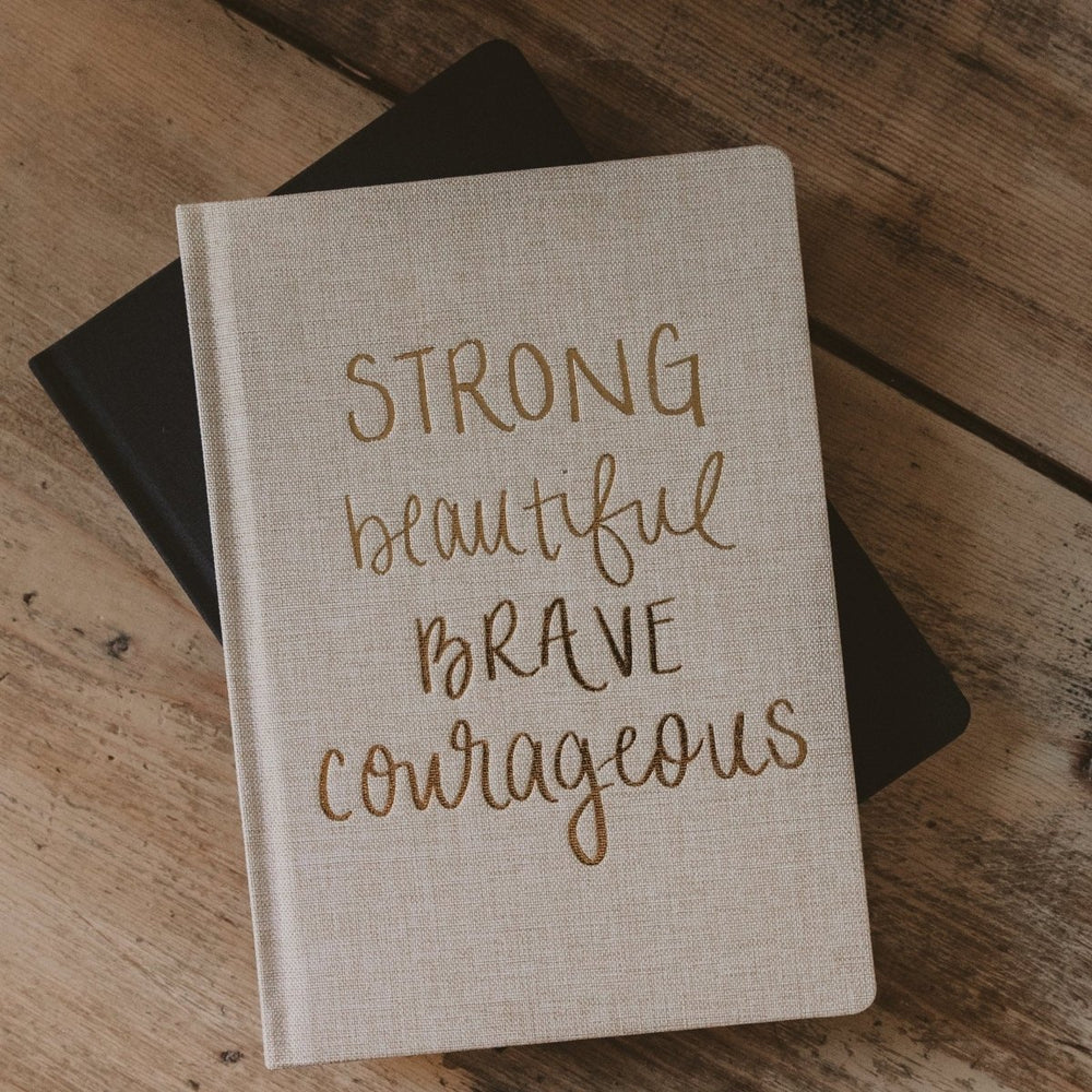 
                      
                        Sweet Water Decor Strong Beautiful Brave Courageous Fabric Journal - lily & onyx
                      
                    