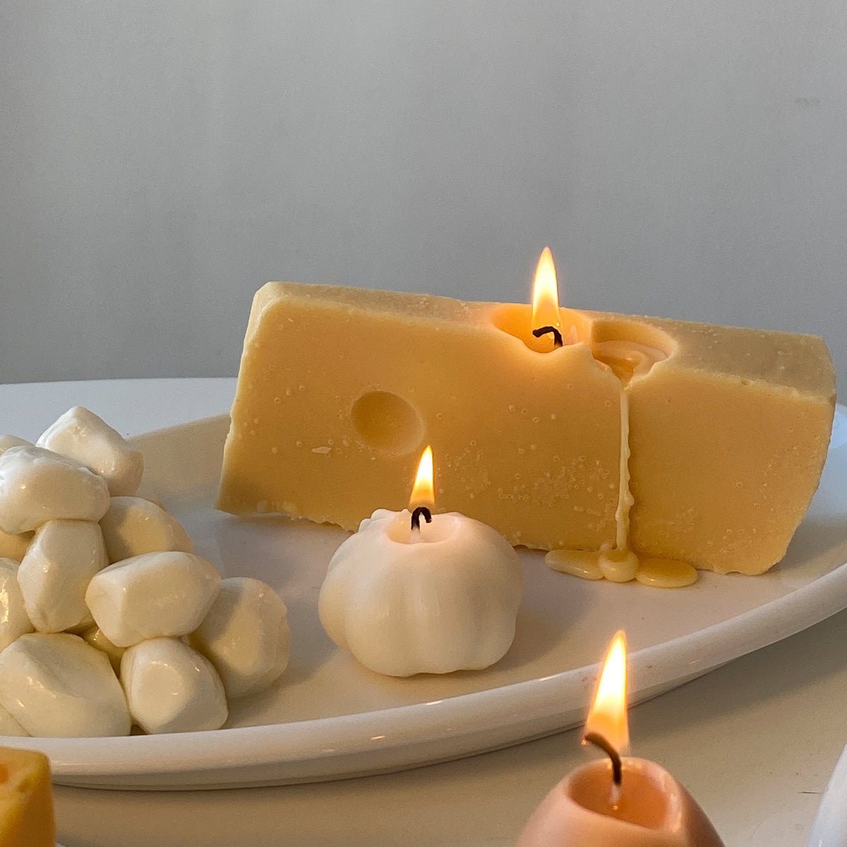 Scandles Swiss Cheese Candle - lily & onyx