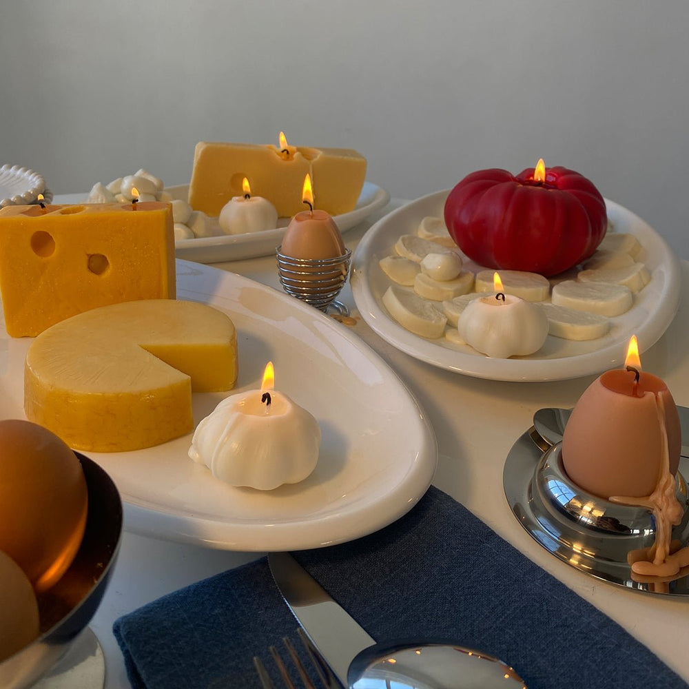 
                      
                        Scandles Swiss Cheese Candle - lily & onyx
                      
                    