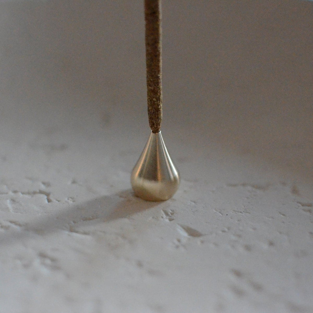 
                      
                        CEDAR AND MYRRH Tall Waterdrop Brass Incense Holder - lily & onyx
                      
                    