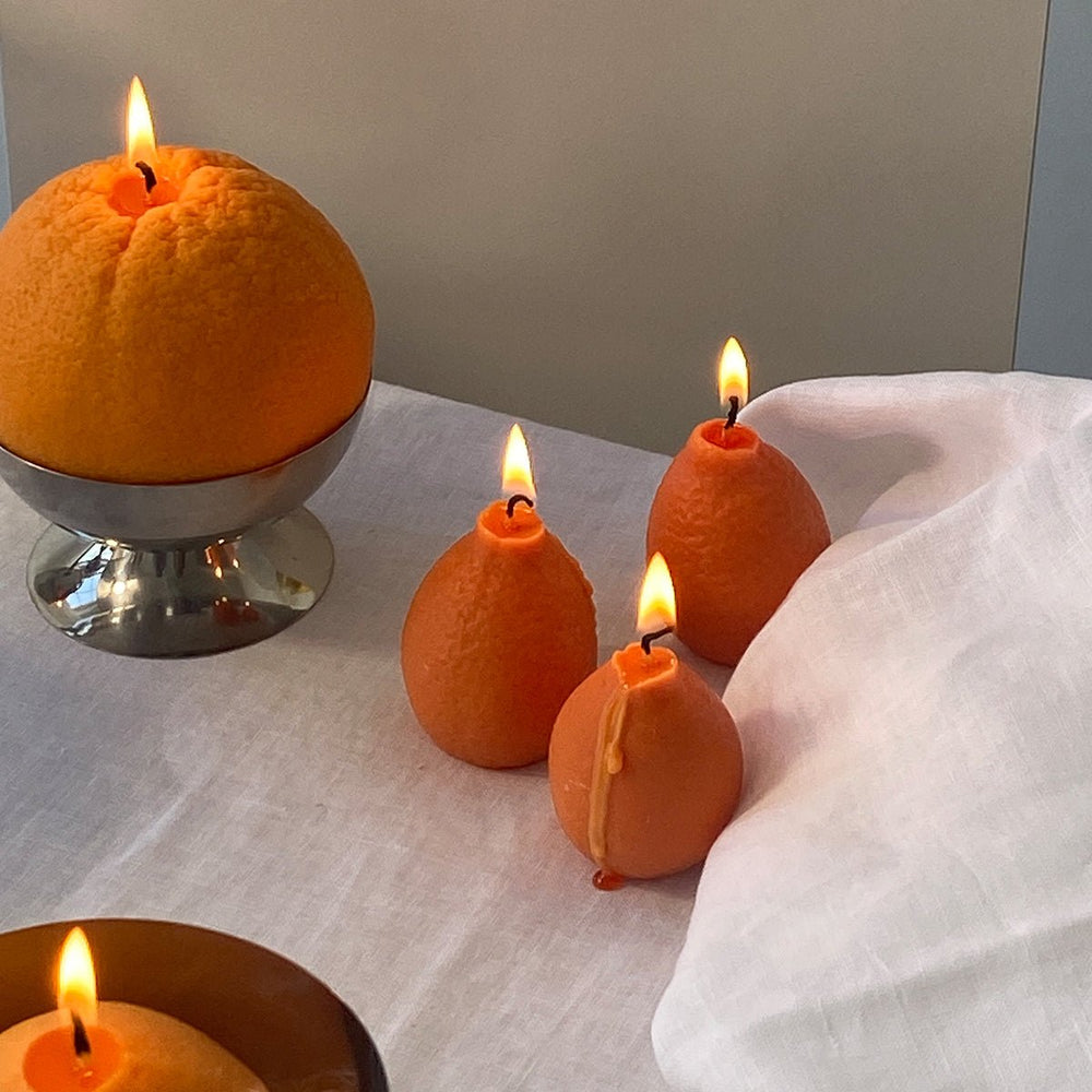 
                      
                        Scandles Tangerine Candle - lily & onyx
                      
                    