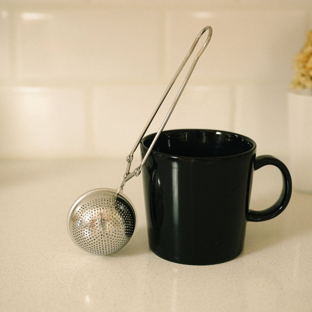 
                      
                        Bamboo Switch Tea Strainer Filter | Stainless Steel - lily & onyx
                      
                    