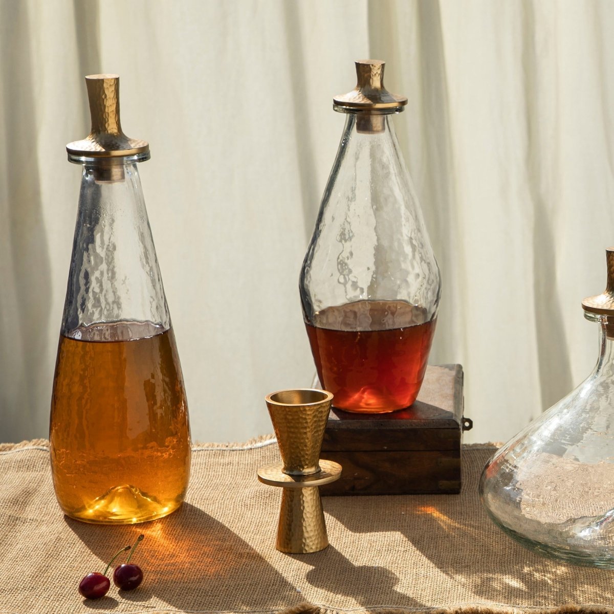 The Collective Pebbled Glass Decanter with Brass Stopper, 33oz