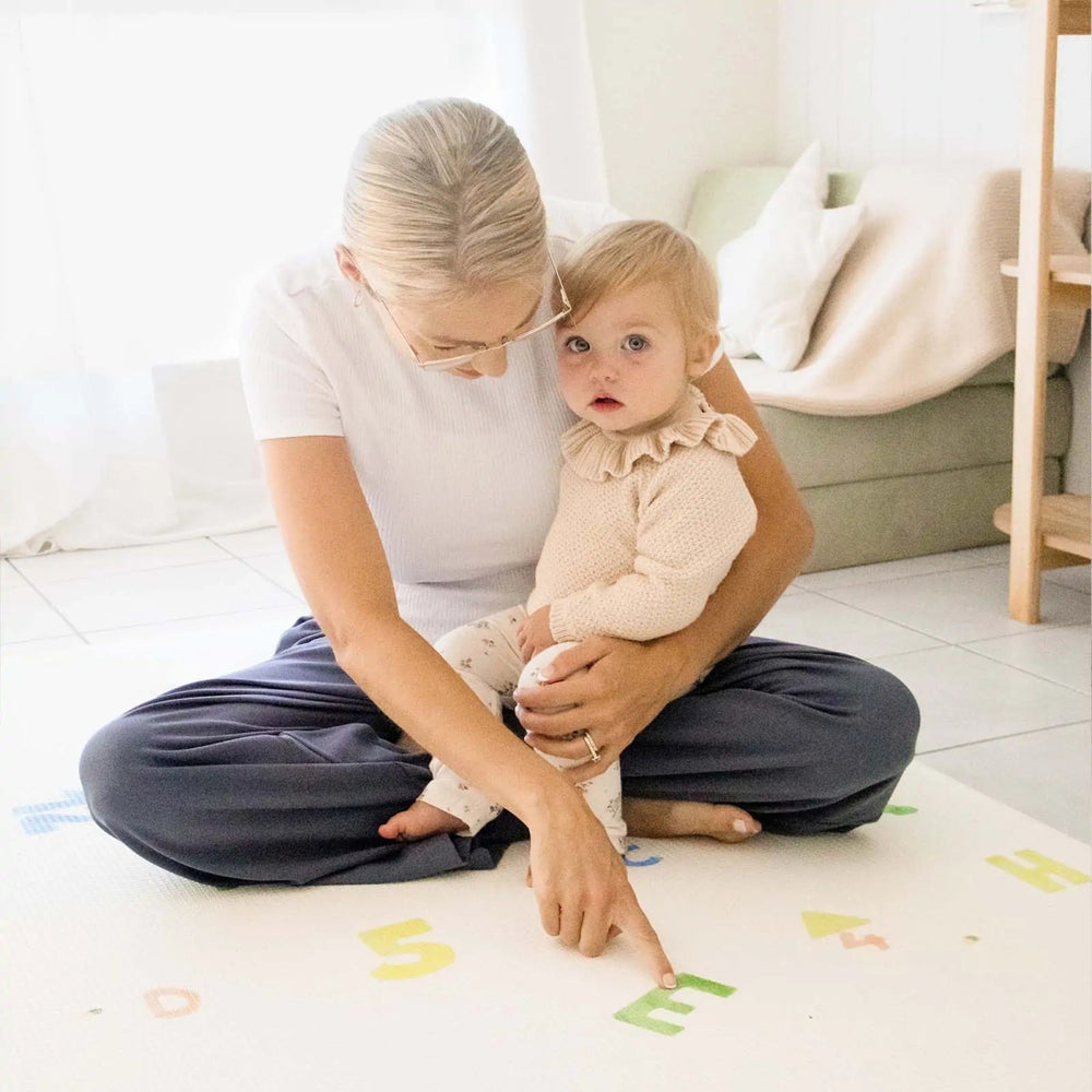 
                      
                        Tiny Land Tiny Land® Double - Sided Baby Playmat Alphabet Adventure - lily & onyx
                      
                    