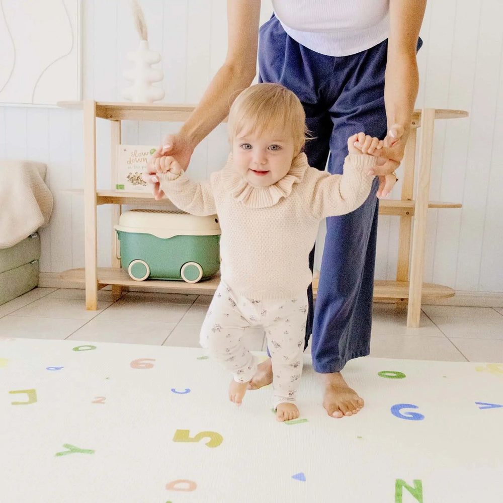 
                      
                        Tiny Land Tiny Land® Double - Sided Baby Playmat Alphabet Adventure - lily & onyx
                      
                    