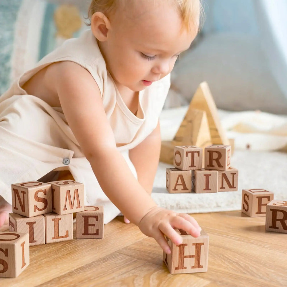 
                      
                        Tiny Land Tiny Land® Wooden Alphabet Blocks - lily & onyx
                      
                    