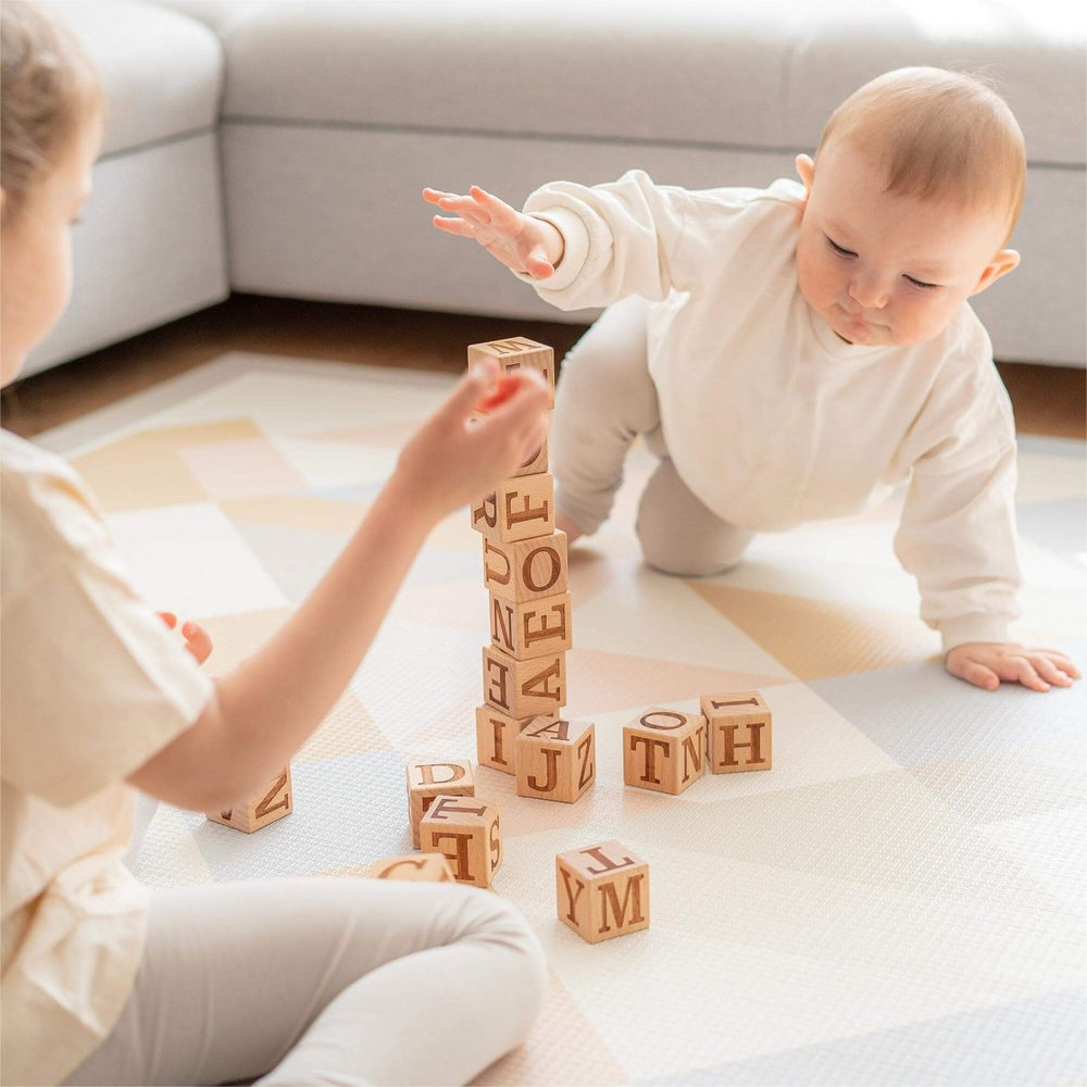 
                      
                        Tiny Land Tiny Land® Wooden Alphabet Blocks - lily & onyx
                      
                    