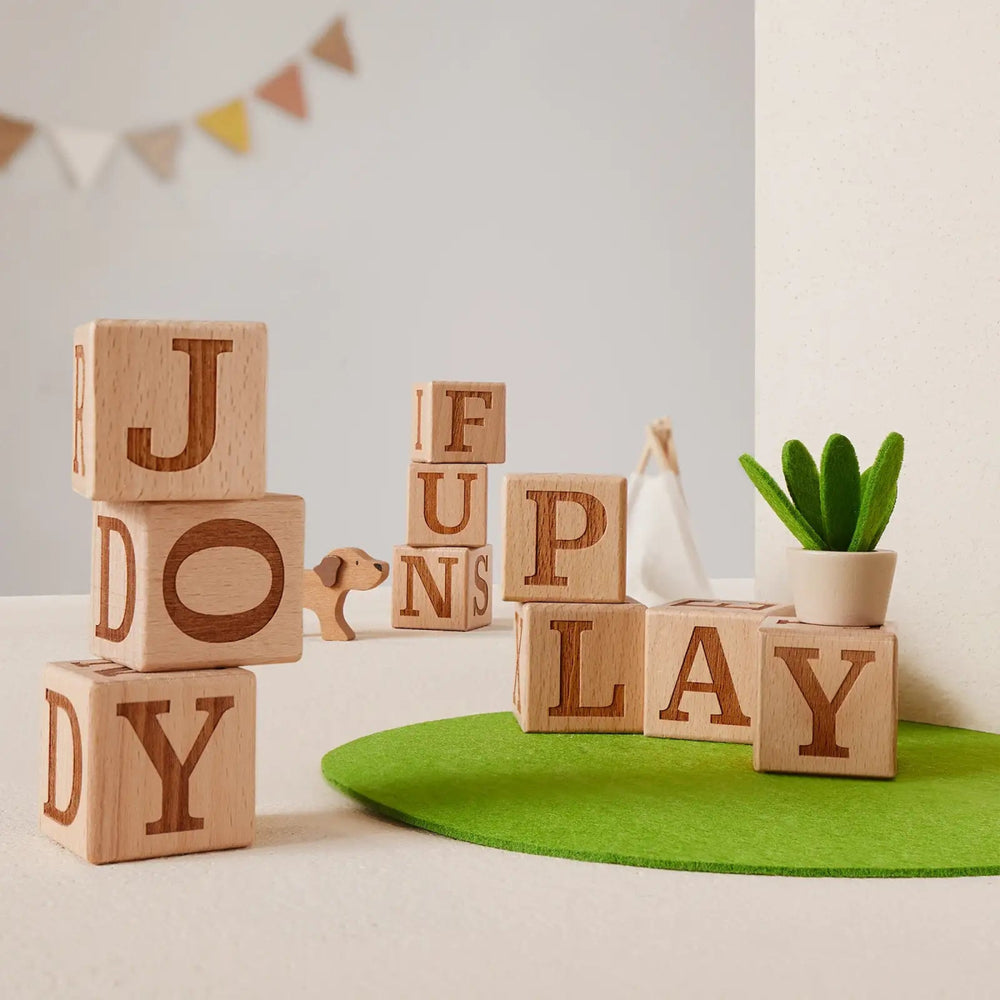 
                      
                        Tiny Land Tiny Land® Wooden Alphabet Blocks - lily & onyx
                      
                    