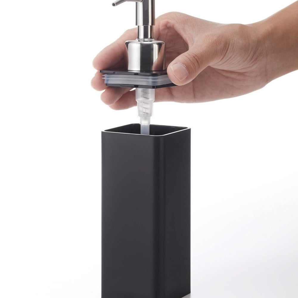 
                      
                        Yamazaki Home Traceless Adhesive Soap Dispenser - lily & onyx
                      
                    