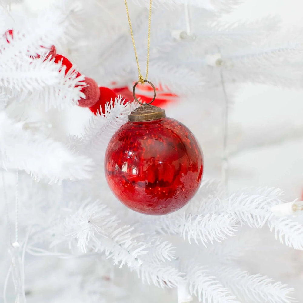 
                      
                        texxture Verona™ Mouth Blown Glass Ornament
                      
                    