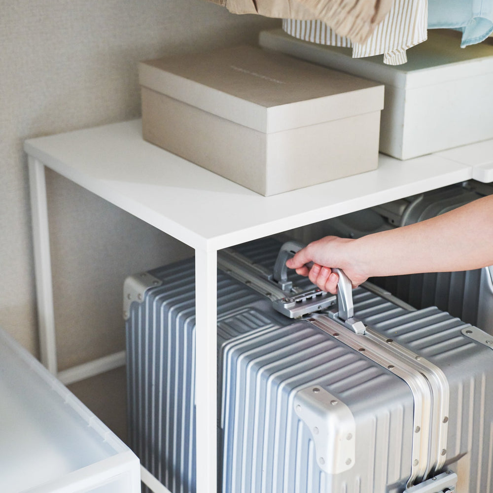 
                      
                        Expandable Steel Suitcase Rack
                      
                    