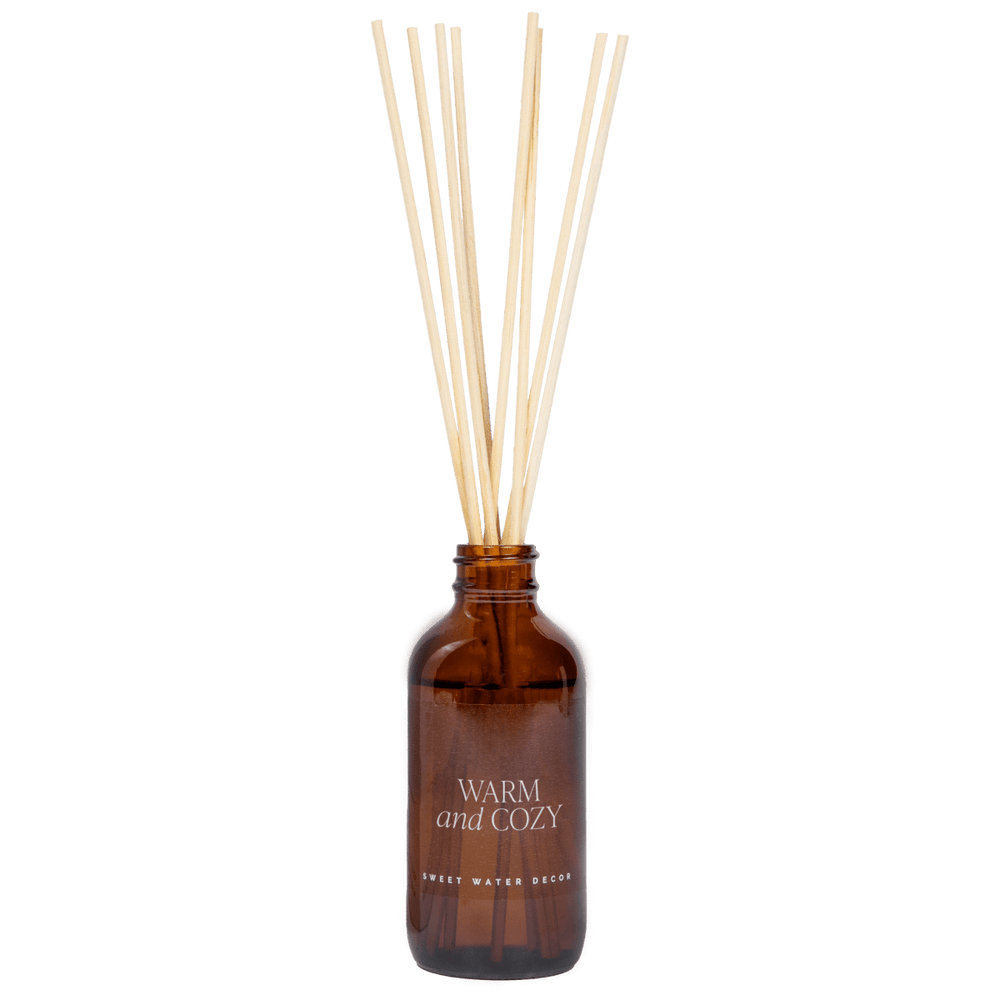 
                      
                        Sweet Water Decor Warm and Cozy Amber Reed Diffuser - lily & onyx
                      
                    