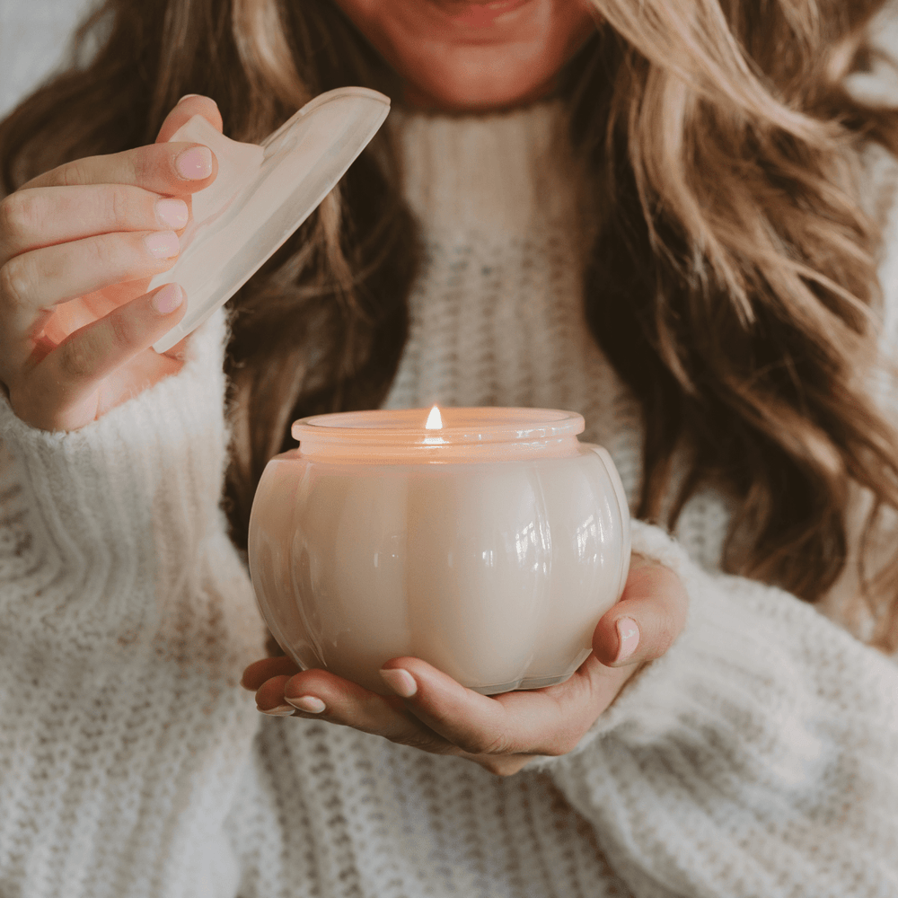 
                      
                        Sweet Water Decor Warm and Cozy Soy Candle - White Translucent Glass Pumpkin Jar - 20 oz - lily & onyx
                      
                    