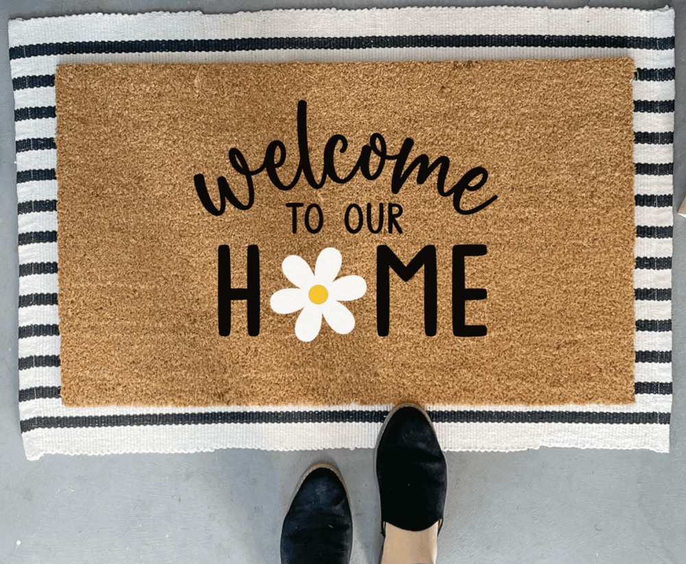 
                      
                        Nickel Designs Custom Doormats Welcome To Our Home Daisy Flower Doormat - lily & onyx
                      
                    