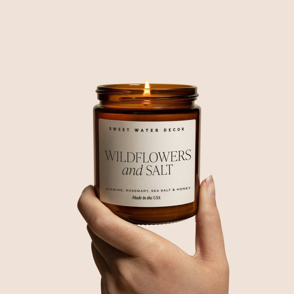 
                      
                        Sweet Water Decor Wildflowers and Salt Soy Candle - Amber Jar - 9 oz - lily & onyx
                      
                    