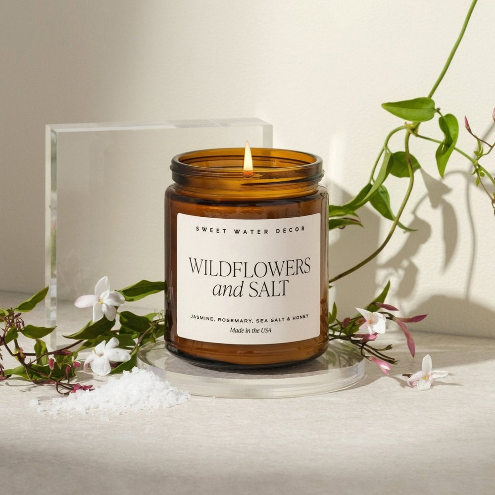 
                      
                        Sweet Water Decor Wildflowers and Salt Soy Candle - Amber Jar - 9 oz - lily & onyx
                      
                    