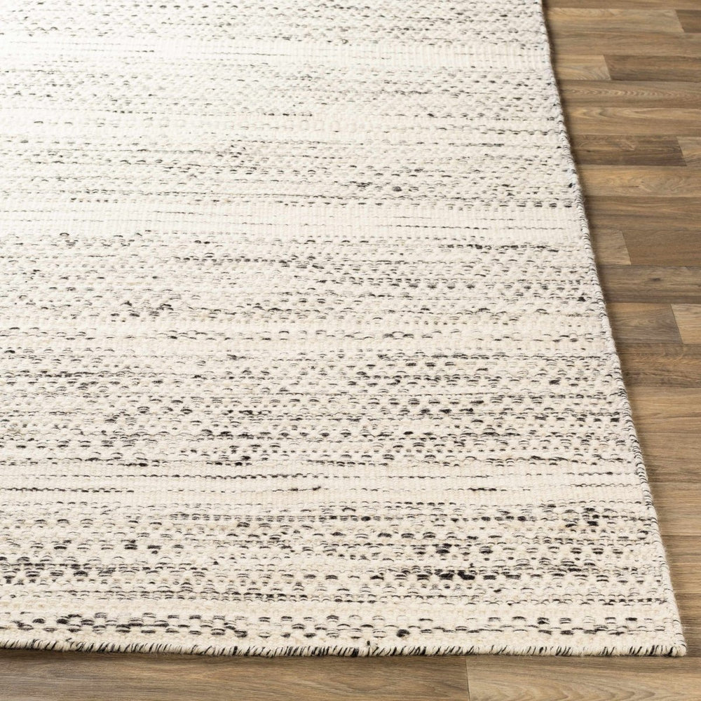 
                      
                        Hauteloom Williford Wool Area Rug - lily & onyx
                      
                    