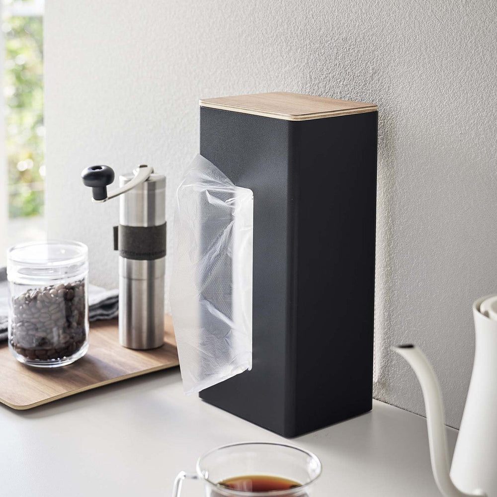 
                      
                        Two-Sided Steel & Wood Tissue Case
                      
                    