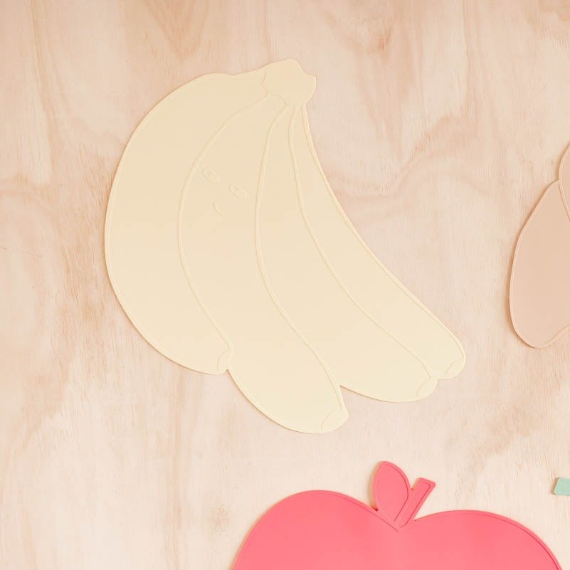 
                      
                        oyoy.us Yummy Banana Placemat - lily & onyx
                      
                    