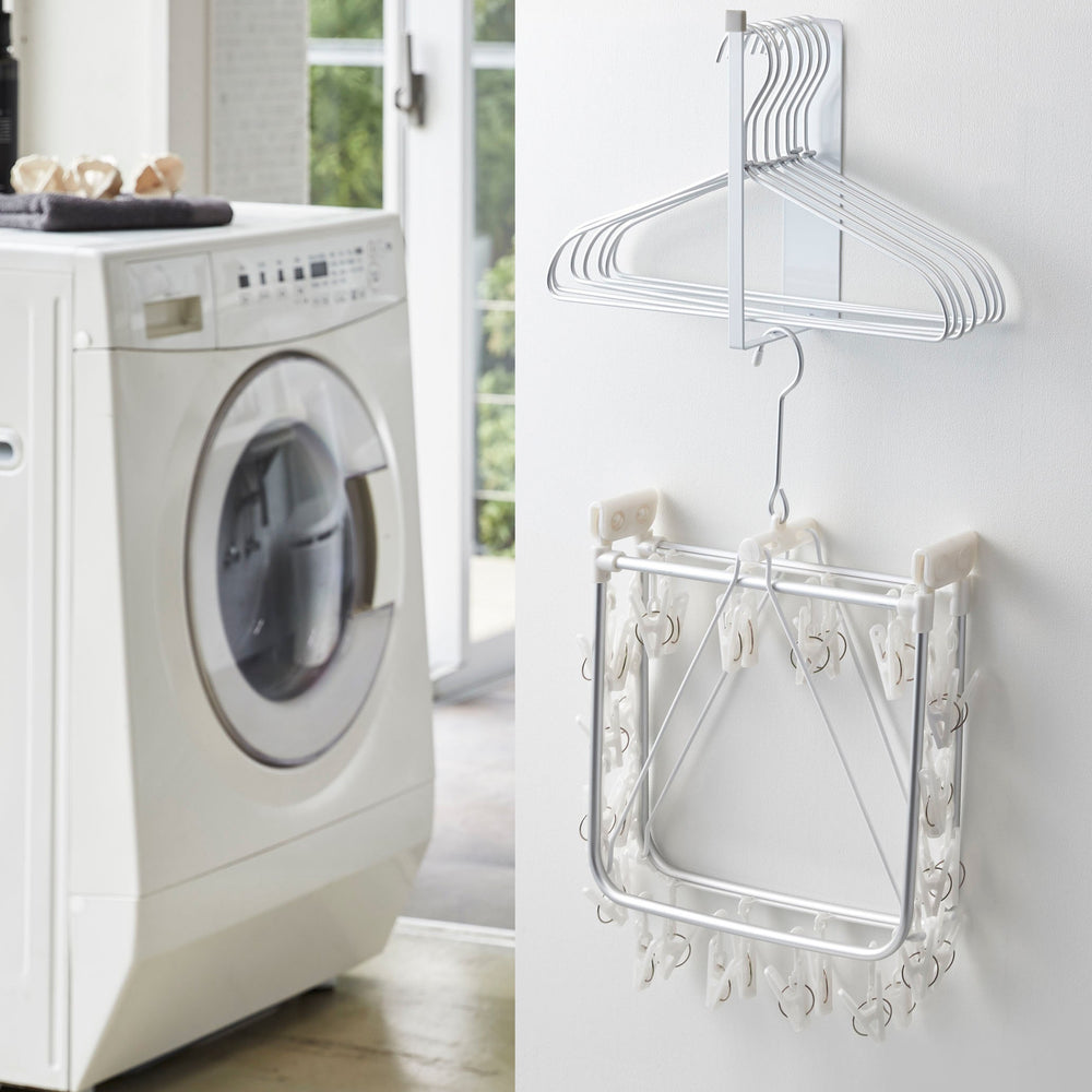 
                      
                        Magnetic Steel Clothes Hanger Rack
                      
                    