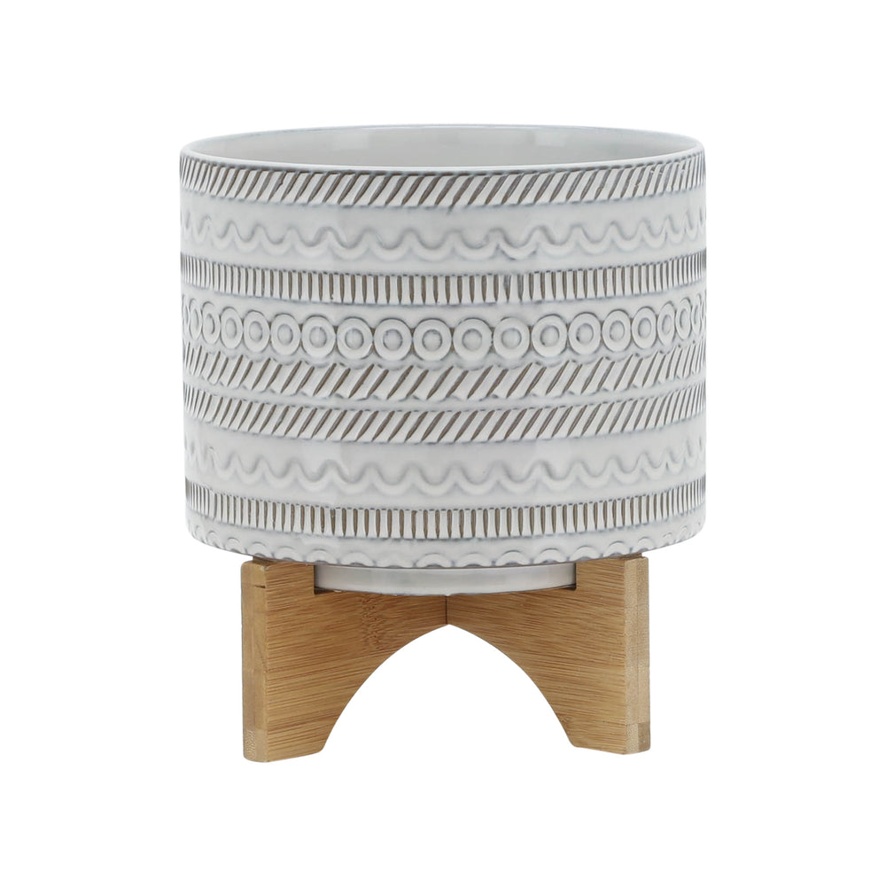 
                      
                        Sagebrook Home Ivory Ceramic Planter with Tribal Inspired Design and Wood Stand - lily & onyx
                      
                    
