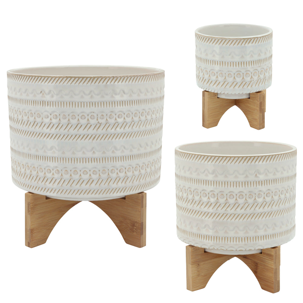
                      
                        Sagebrook Home Ivory Ceramic Planter with Tribal Inspired Design and Wood Stand - lily & onyx
                      
                    