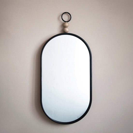 Load image into Gallery viewer, lily &amp;amp; onyx 35.25&amp;quot; Oval Metal Framed Wall Mirror With Wood Beads, Black - lily &amp;amp; onyx
