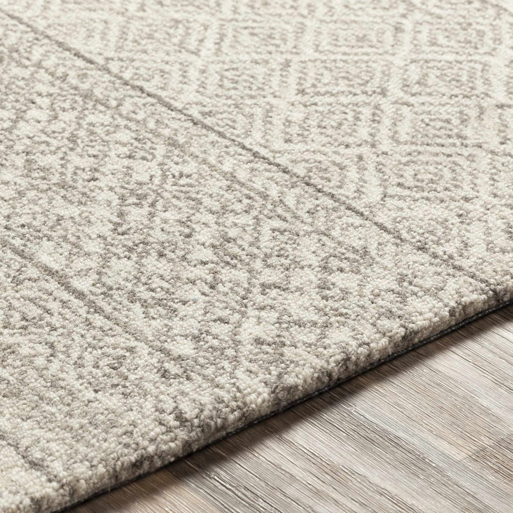 
                      
                        Hauteloom Basinger Wool Area Rug - lily & onyx
                      
                    