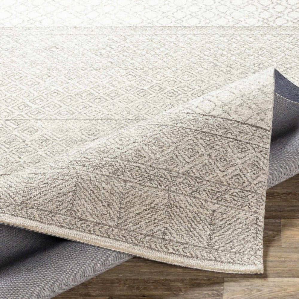 
                      
                        Hauteloom Basinger Wool Area Rug - lily & onyx
                      
                    