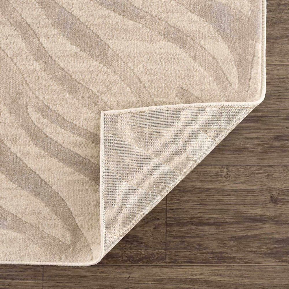 
                      
                        Hauteloom Beige Manteca Zebra Print Area Rug - lily & onyx
                      
                    