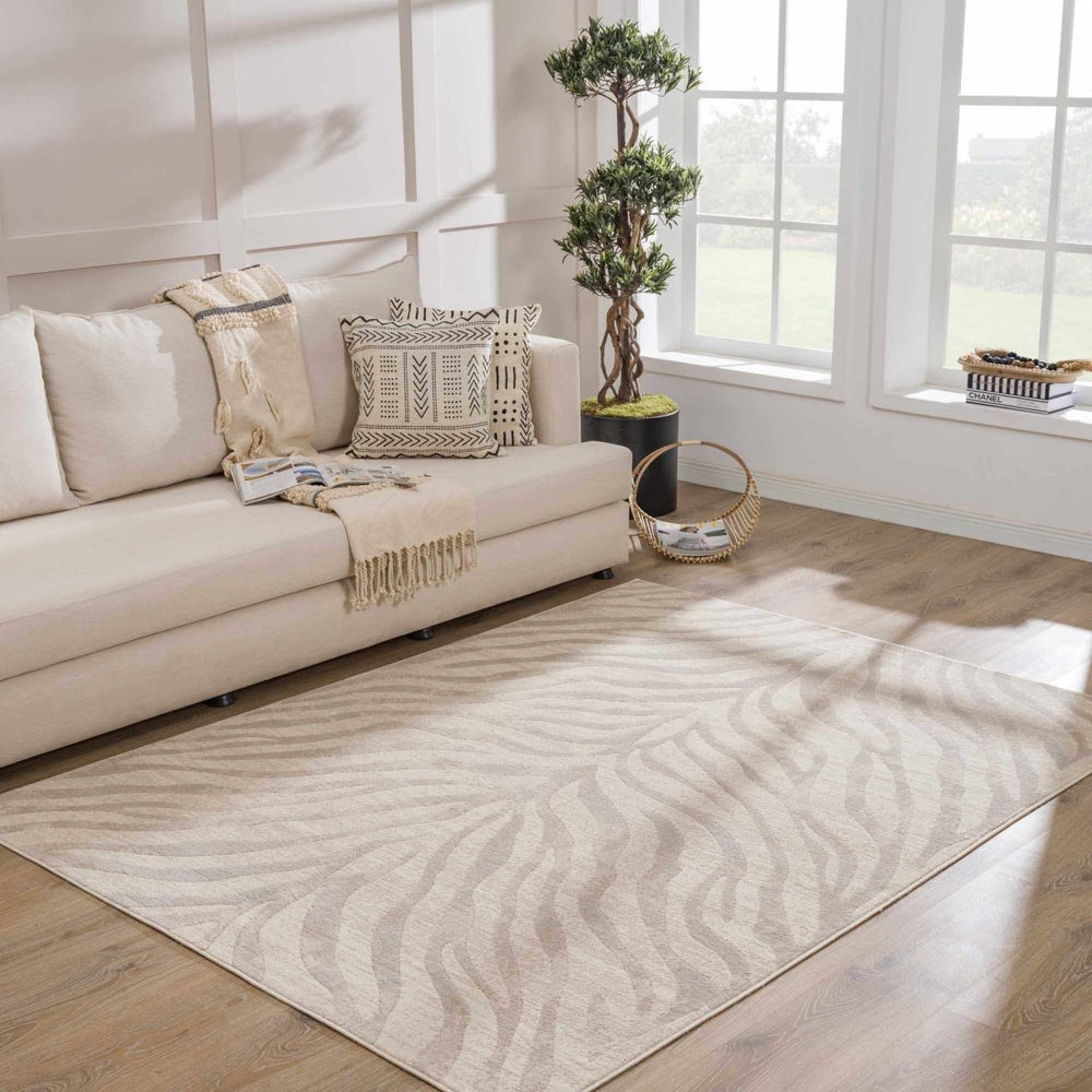 
                      
                        Hauteloom Beige Manteca Zebra Print Area Rug - lily & onyx
                      
                    