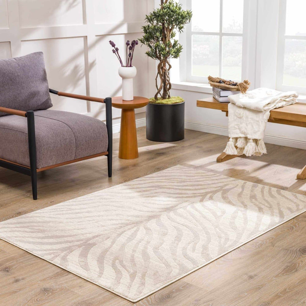 
                      
                        Hauteloom Beige Manteca Zebra Print Area Rug - lily & onyx
                      
                    