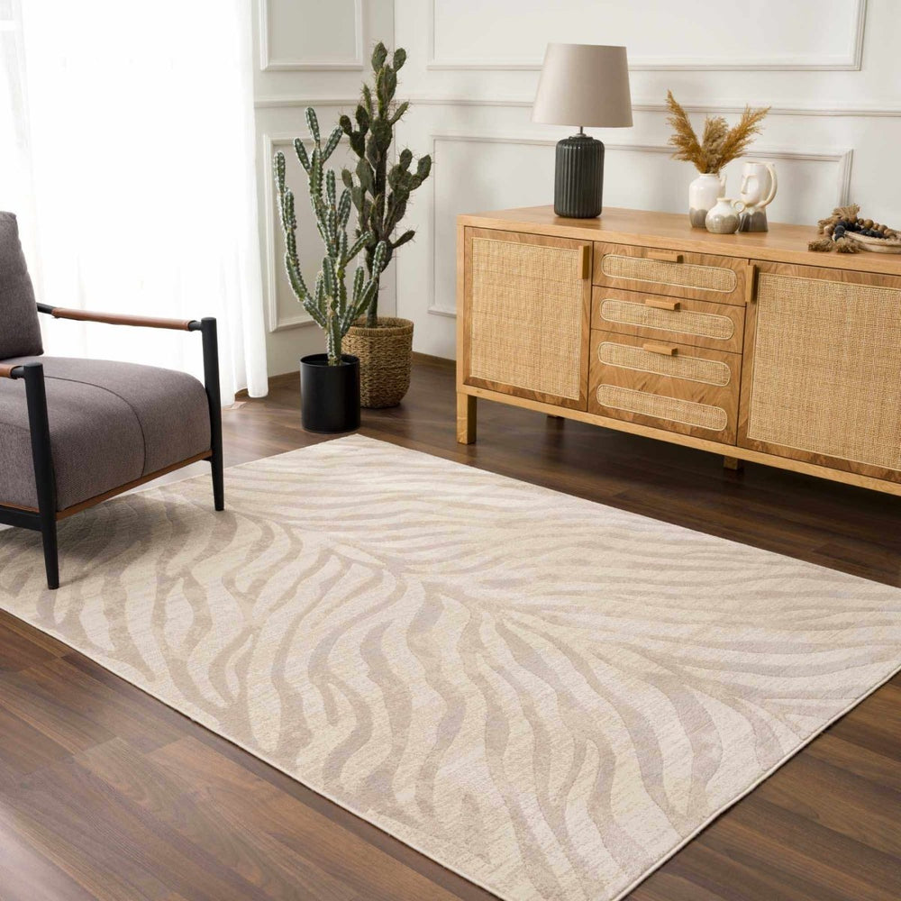 
                      
                        Hauteloom Beige Manteca Zebra Print Area Rug - lily & onyx
                      
                    