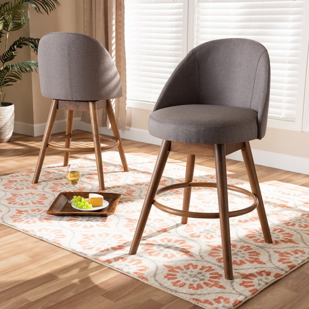 
                      
                        Baxton Studio Carra Mid-Century Modern Fabric Upholstered Walnut-Finished Wood Swivel Counter Stool (Set of 2) - lily & onyx
                      
                    