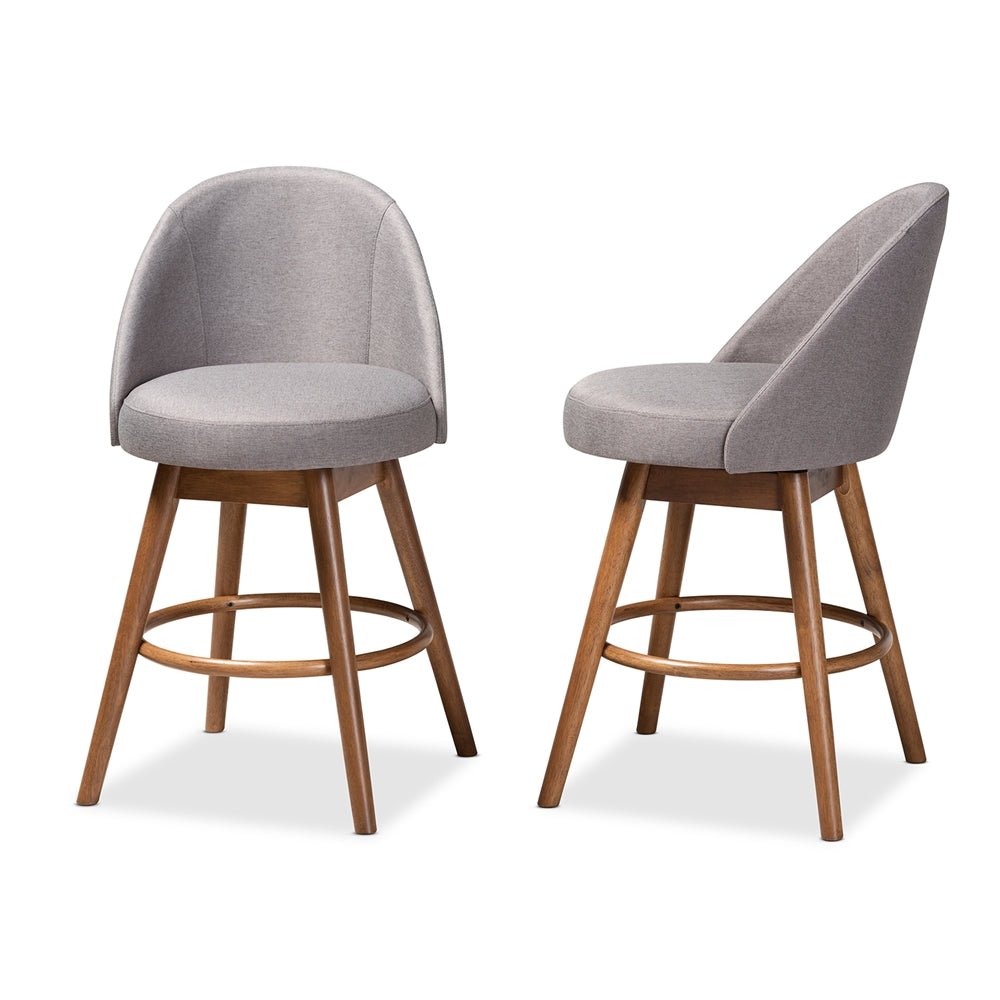 
                      
                        Baxton Studio Carra Mid-Century Modern Fabric Upholstered Walnut-Finished Wood Swivel Counter Stool (Set of 2) - lily & onyx
                      
                    