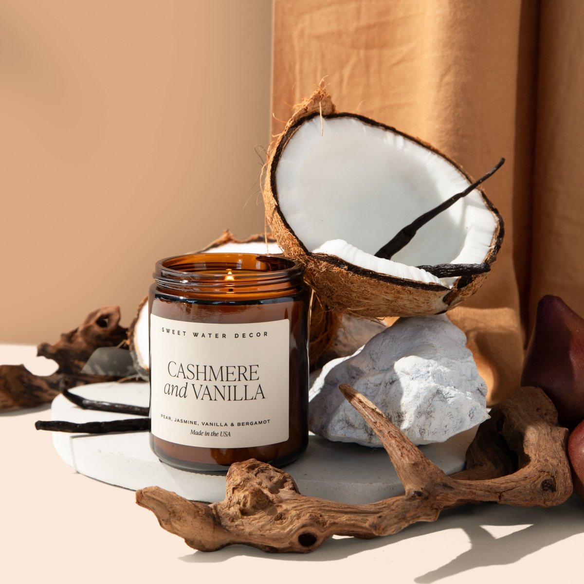 Load image into Gallery viewer, Sweet Water Decor Cashmere and Vanilla Soy Candle - Amber Jar - 9 oz - lily &amp;amp; onyx
