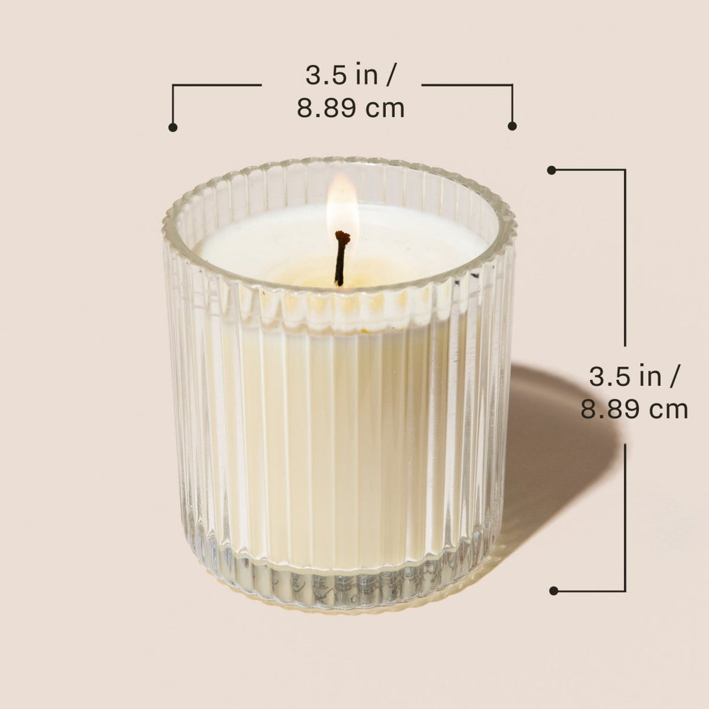 
                      
                        Sweet Water Decor Cashmere and Vanilla Soy Candle - Ribbed Glass Jar - 11 oz - lily & onyx
                      
                    
