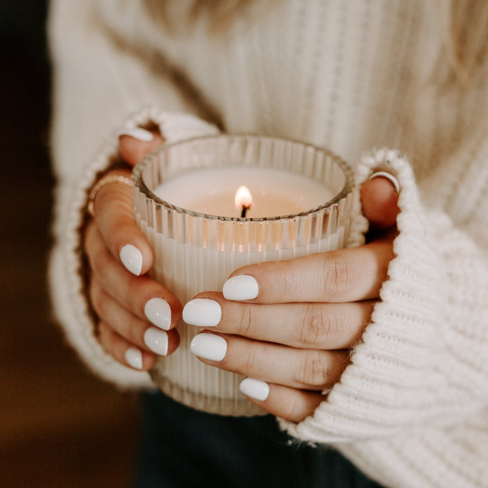 
                      
                        Sweet Water Decor Cashmere and Vanilla Soy Candle - Ribbed Glass Jar - 11 oz - lily & onyx
                      
                    