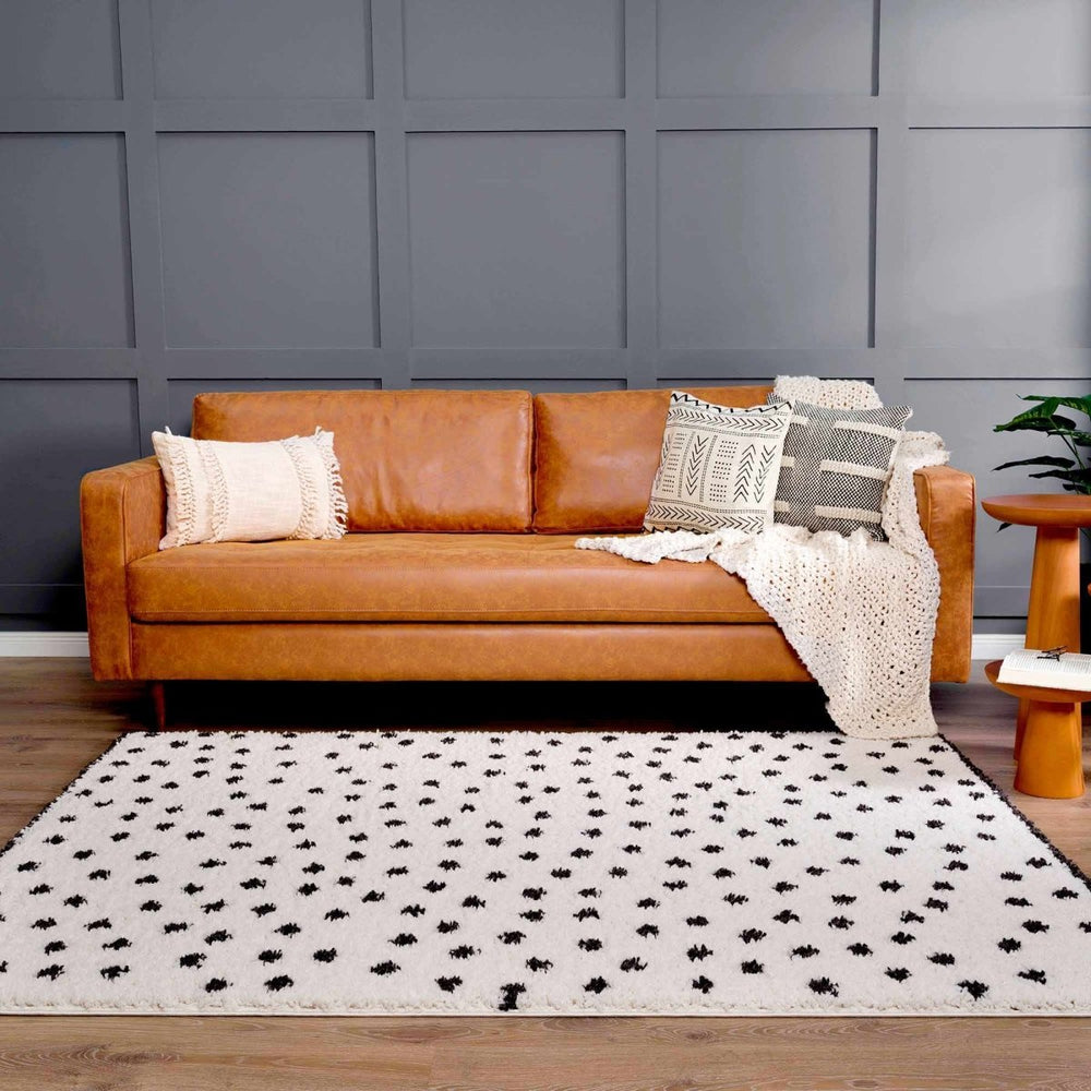 
                      
                        Hauteloom Chaia Dotted Black & White Plush Rug - lily & onyx
                      
                    