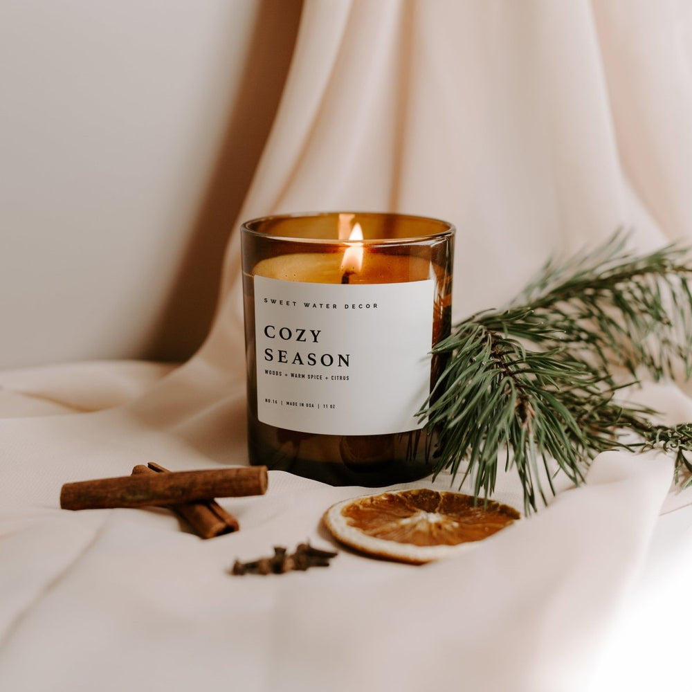 
                      
                        Sweet Water Decor Cozy Season Soy Candle - Amber Jar - 11 oz - lily & onyx
                      
                    