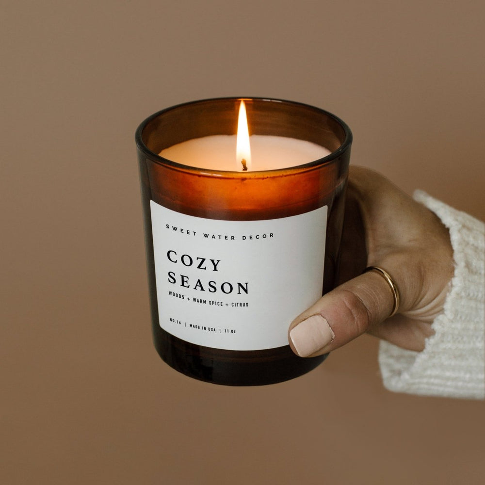 
                      
                        Sweet Water Decor Cozy Season Soy Candle - Amber Jar - 11 oz - lily & onyx
                      
                    