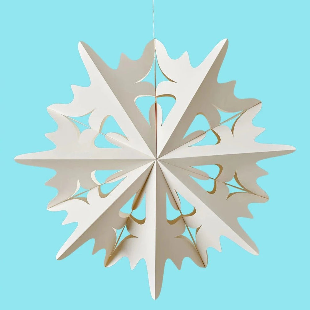 
                      
                        Flurry™ Hanging Paper Snowflake-Crystal against a blue background
                      
                    