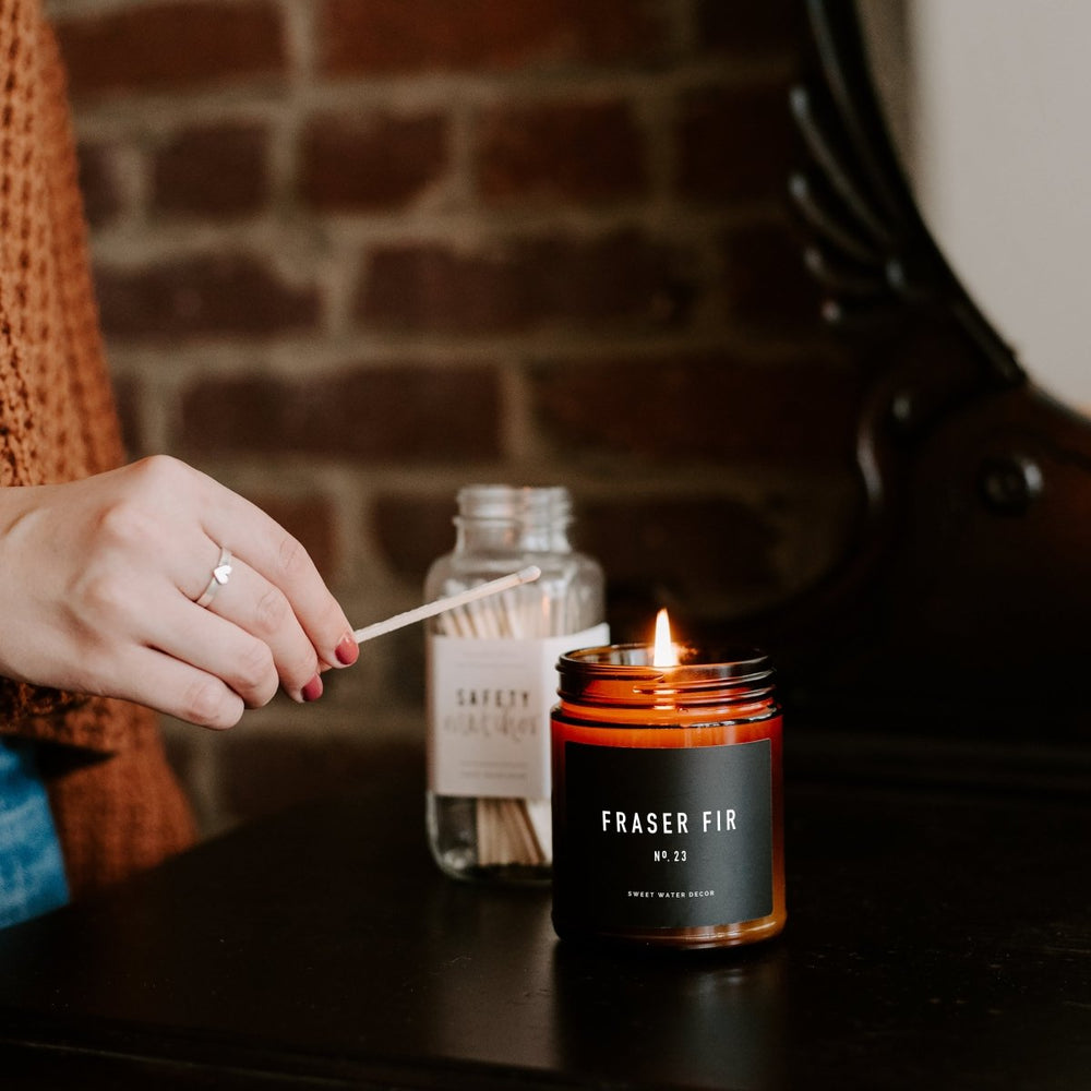 
                      
                        Sweet Water Decor Fraser Fir Soy Candle - Amber Jar - 9 oz - lily & onyx
                      
                    