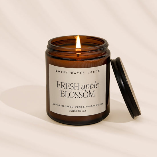 Sweet Water Decor Fresh Apple Blossom Soy Candle - Amber Jar - 9 oz - lily & onyx