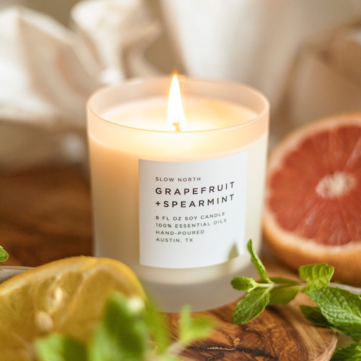 Load image into Gallery viewer, Slow North Grapefruit + Spearmint Frosted Candle, 8 oz - lily &amp;amp; onyx
