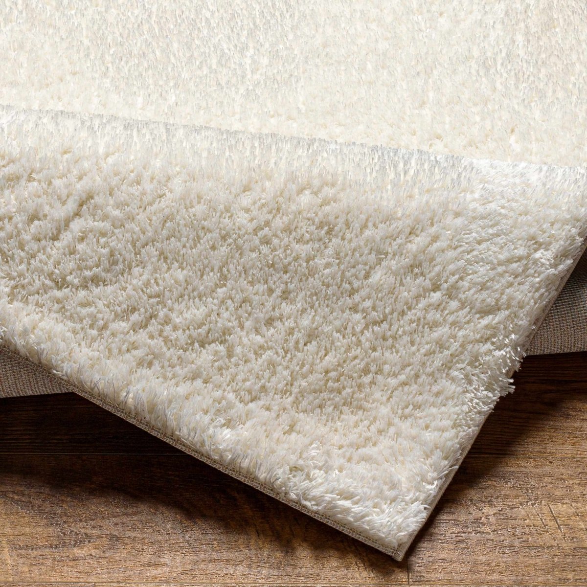 Hauteloom Heavenly Solid Cream Plush Rug - lily & onyx