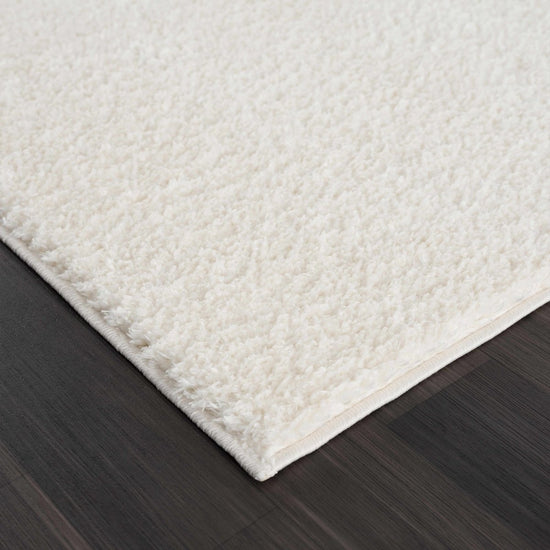 Hauteloom Judy Solid White Washable Rug - lily & onyx